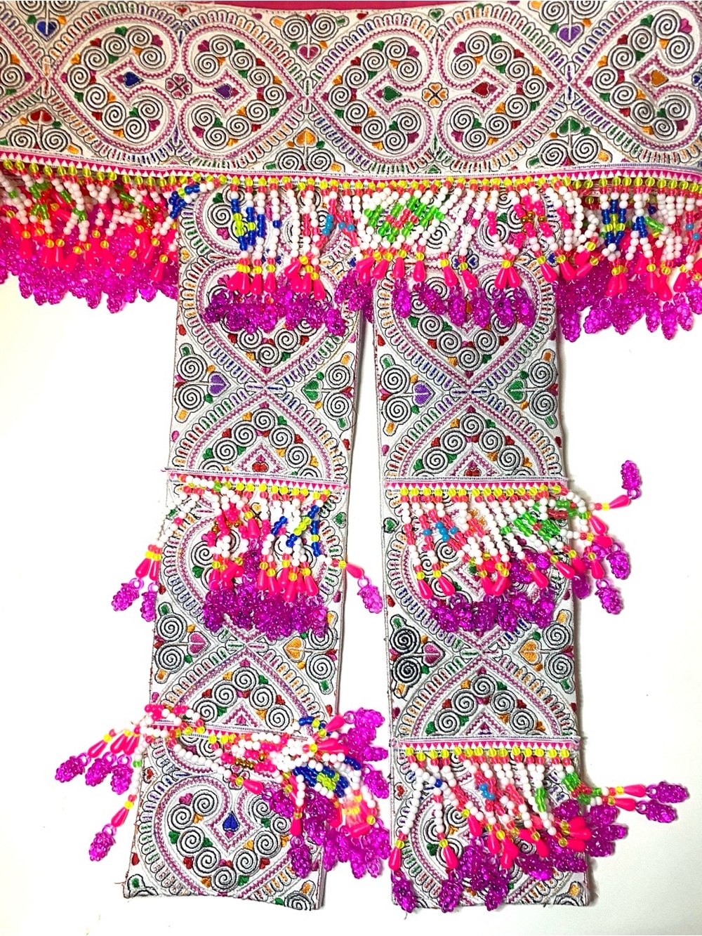 Hmong hlab, a traditional sash featuring intricate embroidery and bright beads